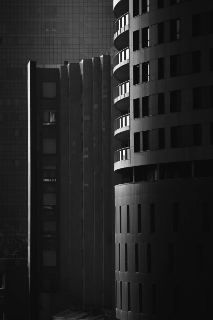 High buildings with sun shining on them in Bilbao City in Spain.